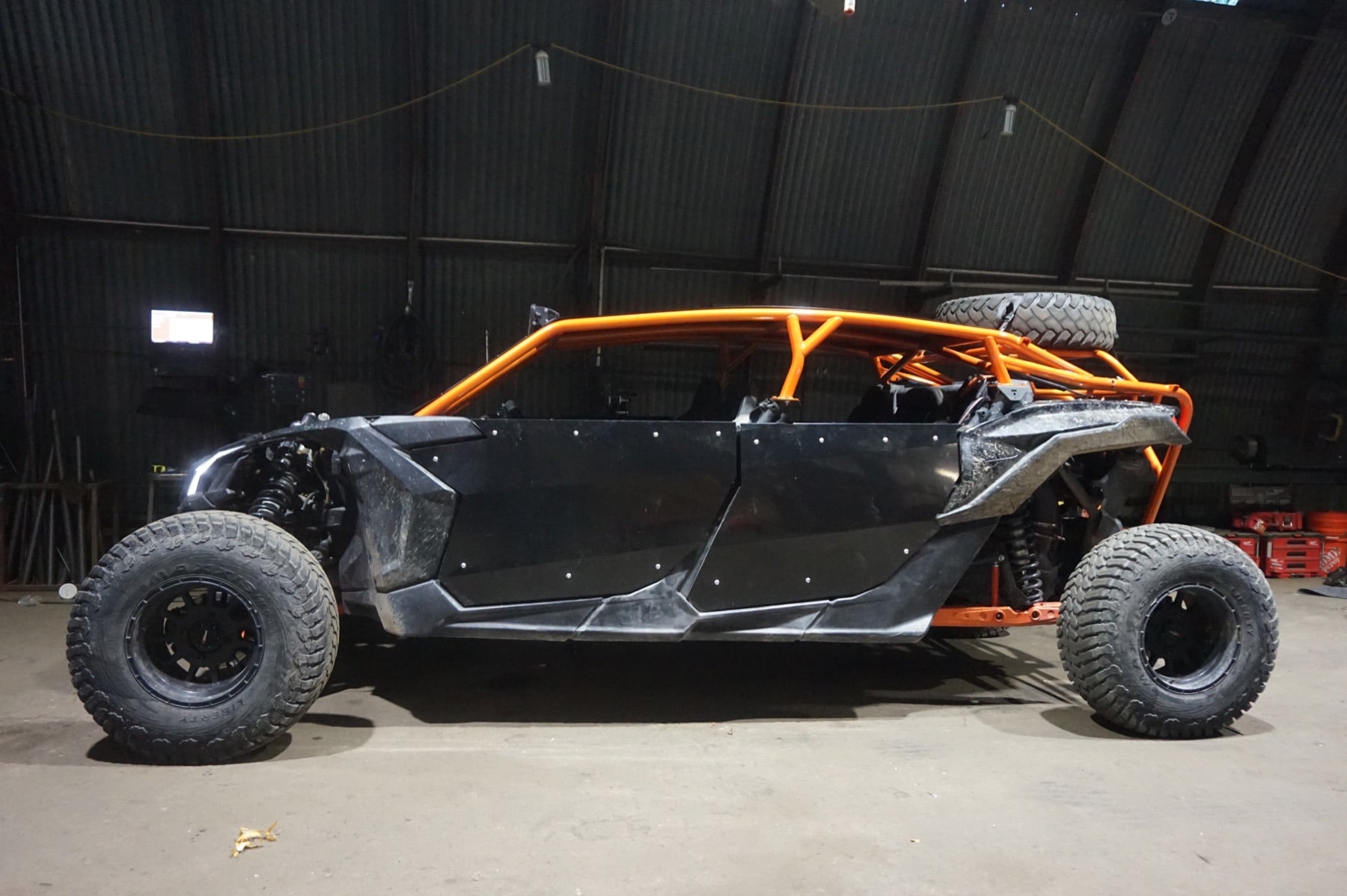 Can-Am Maverick X3 orange custom cage side profile