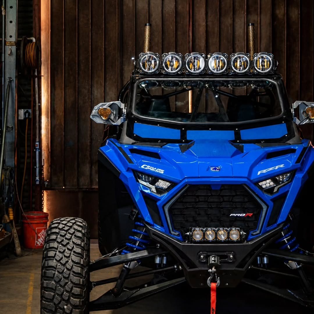 Blue Polaris RZR custom UTV roll cage with lighting